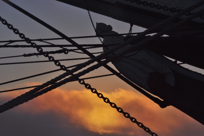 ship in silhouette at the harbor